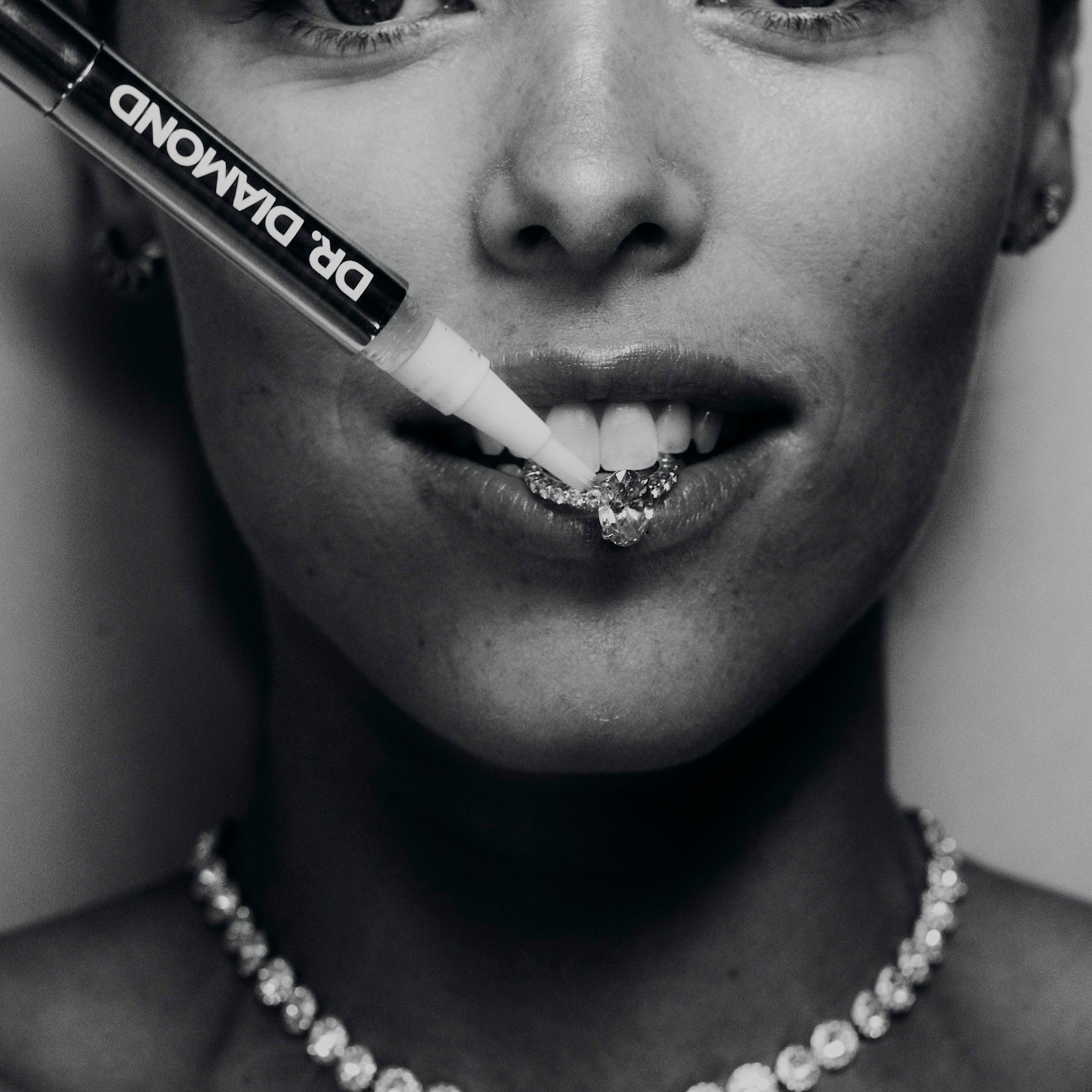 drdiamondjewellerycleaningpencleaningengagementdiamondringinmouthofwoman