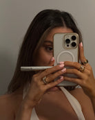 girlinmirrorholdingdrdiamondcleaningpen
